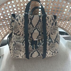 AllSaints leather snakeskin print backpack